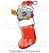 Illustration of a Cartoon Camera Mascot Wearing a Santa Hat Inside a Red Christmas Stocking by Mascot Junction