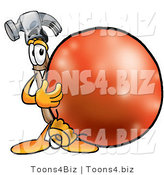 Illustration of a Cartoon Hammer Mascot Standing with a Christmas Bauble by Mascot Junction