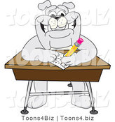 Vector Illustration of a Cartoon Bulldog Mascot Doing Homework at a School Desk by Mascot Junction