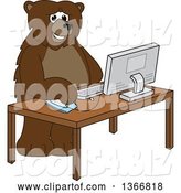 Vector Illustration of a Cartoon Grizzly Bear School Mascot Using a Desktop Computer by Mascot Junction