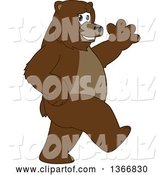 Vector Illustration of a Cartoon Grizzly Bear School Mascot Walking and Waving by Mascot Junction