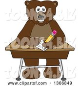 Vector Illustration of a Cartoon Grizzly Bear School Mascot Writing at a Desk by Mascot Junction