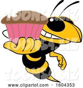 Vector Illustration of a Cartoon Hornet School Mascot Holding a Cupcake by Mascot Junction