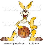 Vector Illustration of a Cartoon Kangaroo Mascot Dribbling a Basketball by Mascot Junction