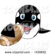 Vector Illustration of a Cartoon Killer Whale Orca Mascot Grabbing a Football by Mascot Junction