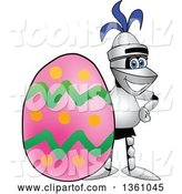 Vector Illustration of a Cartoon Lancer Mascot Posing by an Easter Egg by Mascot Junction