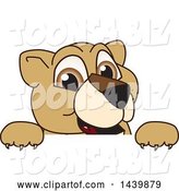 Vector Illustration of a Cartoon Lion Cub School Mascot Looking over a Sign by Mascot Junction