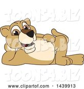 Vector Illustration of a Cartoon Lion Cub School Mascot Resting on His Side by Mascot Junction