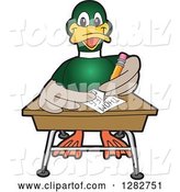 Vector Illustration of a Cartoon Mallard Duck School Mascot Writing at a Desk by Mascot Junction