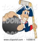 Vector Illustration of a Cartoon Patriot Mascot Grabbing a Hockey Puck and Holding a Stick by Mascot Junction