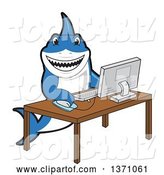 Vector Illustration of a Cartoon Shark School Mascot Using a Desktop Computer by Mascot Junction