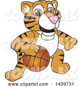 Vector Illustration of a Cartoon Tiger Cub Mascot Playing Basketball by Mascot Junction