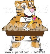 Vector Illustration of a Cartoon Tiger Cub Mascot Taking a Quiz by Mascot Junction