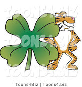 Vector Illustration of a Cartoon Tiger Mascot with a Clover by Mascot Junction