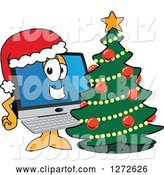 Vector Illustration of a Happy Cartoon PC Computer Mascot Wearing a Santa Hat by a Christmas Tree by Mascot Junction