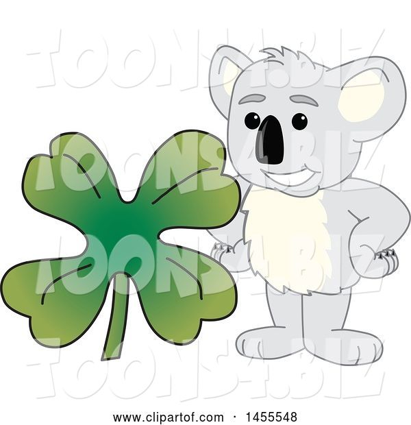 Vector Illustration of a Cartoon Koala Bear Mascot with a St Patricks Day Four Leaf Clover