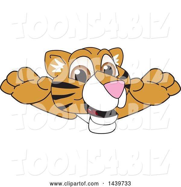 Vector Illustration of a Cartoon Tiger Cub Mascot Leaping