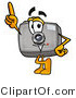 Illustration of a Cartoon Camera Mascot Pointing Upwards by Mascot Junction