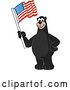 Vector Illustration of a Cartoon Black Bear School Mascot Waving an American Flag by Mascot Junction