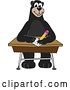 Vector Illustration of a Cartoon Black Bear School Mascot Writing at a Desk by Mascot Junction