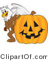 Vector Illustration of a Cartoon Griffin Mascot with a Halloween Pumpkin by Mascot Junction