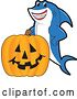 Vector Illustration of a Cartoon Shark School Mascot with a Jackolantern Pumpkin by Mascot Junction