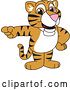 Vector Illustration of a Cartoon Tiger Cub Mascot Pointing by Mascot Junction