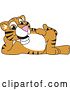 Vector Illustration of a Cartoon Tiger Cub Mascot Relaxing by Mascot Junction