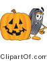 Vector Illustration of a Cartoon Tire Mascot with a Carved Halloween Pumpkin by Mascot Junction