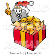 Illustration of a Cartoon Camera Mascot Standing by a Christmas Present by Mascot Junction