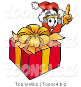 Illustration of a Cartoon Paint Brush Mascot Standing by a Christmas Present by Mascot Junction