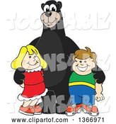 Vector Illustration of a Cartoon Black Bear School Mascot Posing with Students by Mascot Junction