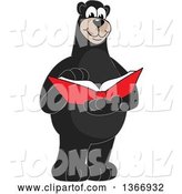 Vector Illustration of a Cartoon Black Bear School Mascot Reading a Book by Mascot Junction