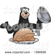 Vector Illustration of a Cartoon Black Bear School Mascot Serving a Roasted Thanksgiving Turkey by Mascot Junction