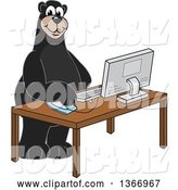 Vector Illustration of a Cartoon Black Bear School Mascot Using a Desktop Computer by Mascot Junction