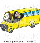 Vector Illustration of a Cartoon Black Bear School Mascot Waving and Driving a School Bus by Toons4Biz