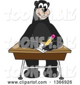 Vector Illustration of a Cartoon Black Bear School Mascot Writing at a Desk by Mascot Junction