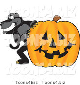 Vector Illustration of a Cartoon Black Jaguar Mascot with a Halloween Pumpkin by Mascot Junction