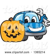 Vector Illustration of a Cartoon Blue Car Mascot Holding a Wrench by a Halloween Jackolantern Pumpkin by Mascot Junction
