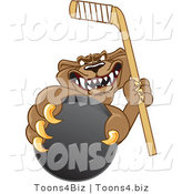 Vector Illustration of a Cartoon Cougar Mascot Character Grasping a Hockey Puck by Mascot Junction