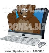 Vector Illustration of a Cartoon Grizzly Bear School Mascot Emerging from a Desktop Computer Screen by Mascot Junction