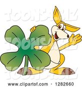 Vector Illustration of a Cartoon Kangaroo Mascot Leaning on a St Patricks Day Four Leaf Clover Shamrock by Mascot Junction