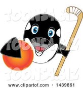 Vector Illustration of a Cartoon Killer Whale Orca Mascot Grabbing a Field Hockey Ball and Holding a Stick by Mascot Junction