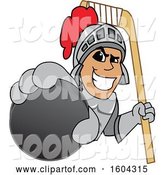 Vector Illustration of a Cartoon Knight Mascot Holding a Hockey Puck and Stick by Mascot Junction