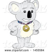 Vector Illustration of a Cartoon Koala Bear Mascot Champion Wearing a Medal by Mascot Junction