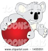 Vector Illustration of a Cartoon Koala Bear Mascot Grabbing a Red Ball by Mascot Junction