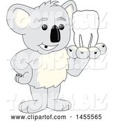 Vector Illustration of a Cartoon Koala Bear Mascot Holding a Tooth by Mascot Junction