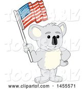 Vector Illustration of a Cartoon Koala Bear Mascot Holding an American Flag by Mascot Junction