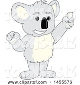 Vector Illustration of a Cartoon Koala Bear Mascot Holding up a Finger by Mascot Junction