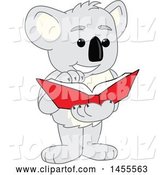 Vector Illustration of a Cartoon Koala Bear Mascot Reading a Book by Mascot Junction